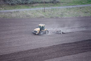 farm field preparation, plowing, discing, leveling